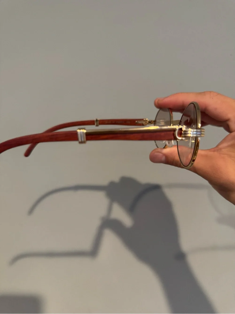 Cartier Gold Round Metal Frame Sunglasses with Brown Temples